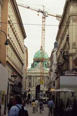 The green-domed Peterskirche behind construction cranes — Vienna, Austria (12-16 June 2000)