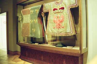 Embroidered coronation vestments in a Treasury display case — Vienna, Austria (12-16 June 2000)