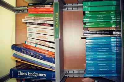 Shelves of Italian chess books in a bookshop — Milan, Italy (12-16 June 2000)