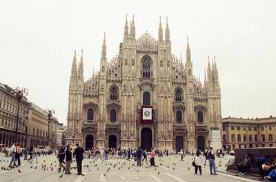 The Duomo facade above the pigeon-filled piazza — Milan, Italy (12-16 June 2000)