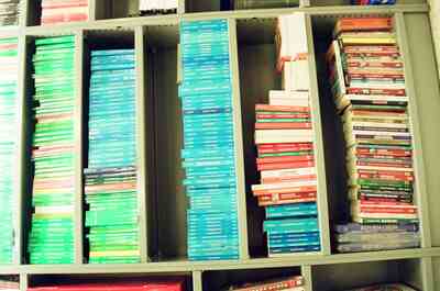Stacks of coloured chess books on store shelves — Milan, Italy (12-16 June 2000)