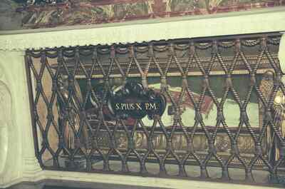 The glass tomb of St Pius X behind a bronze grille — St Peter's Basilica, Vatican City (21-27 May 2000)