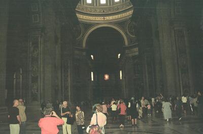 Visitors beneath the soaring dome of St Peter's — St Peter's Basilica, Vatican City (21-27 May 2000)