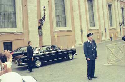 The Pope's black car passing a saluting officer — Vatican City, Vatican City (21-27 May 2000)