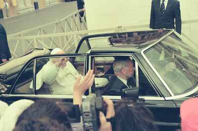The Pope waving from his open black limousine — St Peter's Basilica, Vatican City (21-27 May 2000)