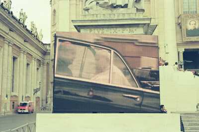 The Popemobile shown close up on the square screen — St Peter's Basilica, Vatican City (21-27 May 2000)