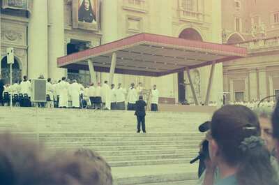 Clergy at the altar during the open-air papal Mass — St Peter's Basilica, Vatican City (21-27 May 2000)