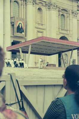The papal canopy and basilica from the crowd — St Peter's Basilica, Vatican City (21-27 May 2000)