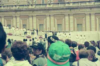 A procession of clergy in white before the colonnade — St Peter's Basilica, Vatican City (21-27 May 2000)