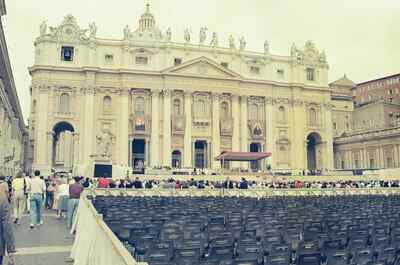 The basilica facade above rows of empty chairs — St Peter's Basilica, Vatican City (20-25 May 2000)