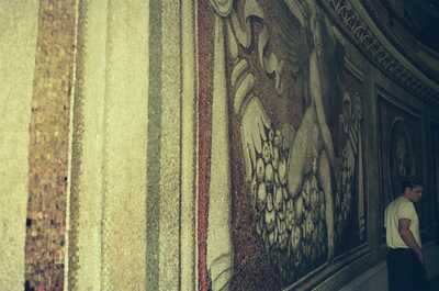 A man beside a gilded mosaic in St Peter's Basilica — St Peter's Basilica, Vatican City (21-27 May 2000)