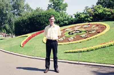 Richard standing before the Geneva flower clock — Geneva, Switzerland (1-3 July 2000)