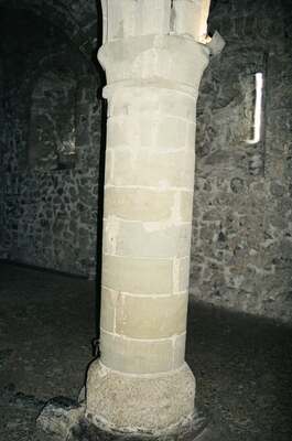A stone pillar in the dungeon of Chateau de Chillon — Montreux, Switzerland (1 July 2000)