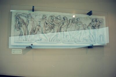 A carved Roman marriage sarcophagus relief behind glass — Vatican Museums, Vatican City (21-27 May 2000)