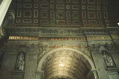 The gilded inscription and arch beneath St Peter's dome — St Peter's Basilica, Vatican City (21-27 May 2000)