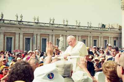 Pope John Paul II in the popemobile amid a cheering crowd — St Peter's Basilica, Vatican City (21-27 May 2000)