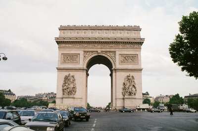 The Arc de Triomphe rising above busy traffic — Paris, France (22-28 June 2000)