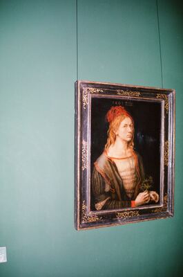 A small Vermeer-style painting in an inlaid frame — Paris, France (22-28 June 2000)