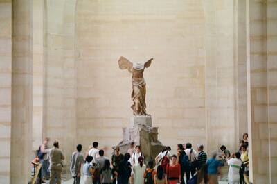 The Winged Victory of Samothrace atop its stairs — Paris, France (22-28 June 2000)