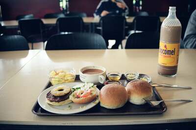A cafeteria tray with a burger and a Chocomel bottle — Netherlands, The Netherlands (19-26 June 2000)
