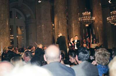Two singers perform among the crowded concert hall pillars — Vienna, Austria (14-16 June 2000)