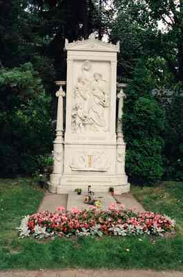 The Franz Schubert grave monument with red flower beds — Vienna, Austria (14-16 June 2000)