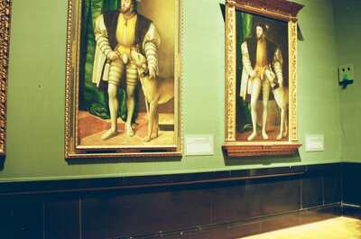 Two royal Renaissance portraits hung on a green museum wall — Vienna, Austria (16-18 June 2000)
