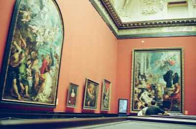 Large Rubens canvases lining a deep red gallery hall — Vienna, Austria (16-18 June 2000)
