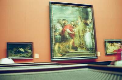 A monumental religious painting framed on a red gallery wall — Vienna, Austria (16-18 June 2000)