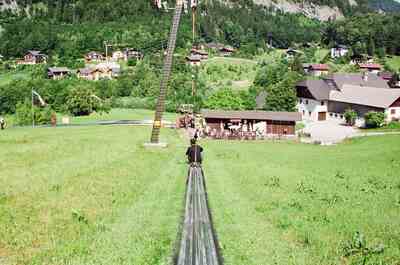 A rider descends the metal summer toboggan track — Salzkammergut, Austria (16-18 June 2000)