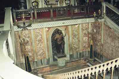 Bronze statue in a marble chapel seen from above — Rome, Italy (late May 2000)
