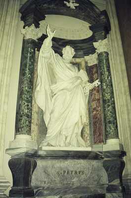 Marble papal tomb effigy beside an S. Petrus pillar — Rome, Italy (late May 2000)
