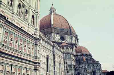 The Duomo's marble flank and brick dome against the sky — Florence, Italy (26 May 2000)