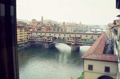 The Ponte Vecchio spanning the Arno in the rain — Florence, Italy (26 May 2000)