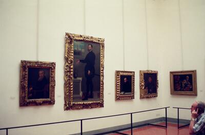 Old master portraits hung in an Uffizi gallery room — Florence, Italy (26 May 2000)