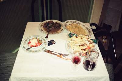 A spread hotel dinner with wine and dessert — Tuscany, Italy (26-27 May 2000)