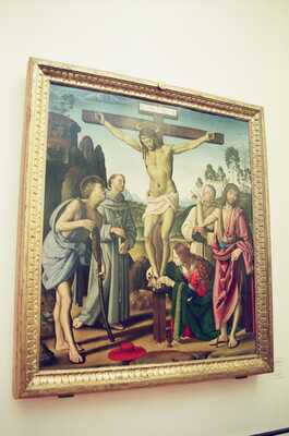 Framed Renaissance Crucifixion painting on a wall — Florence, Italy (26-27 May 2000)