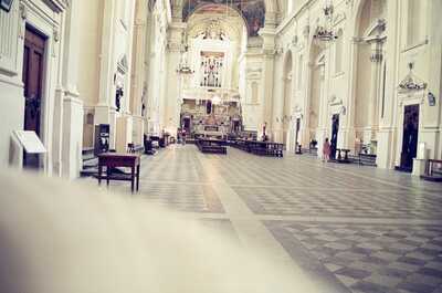 A bright baroque church nave with a tiled floor — Tuscany, Italy (26-27 May 2000)