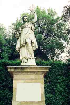 A classical garden statue on a tall pedestal — Florence, Italy (26-27 May 2000)