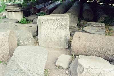 An inscribed stone block among toppled columns in the Forum — Rome, Italy (21-27 May 2000)