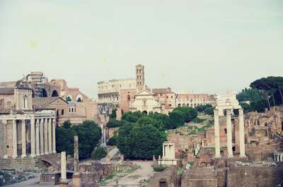The Arch of Titus glowing against a hazy sky — Rome, Italy (21-27 May 2000)