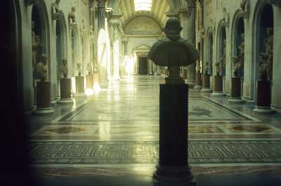 A marble bust on a plinth in the Gallery of Busts — Vatican Museums, Vatican City (21-27 May 2000)