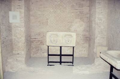 A lion-faced sarcophagus panel inside the mausoleum — Gaeta & the coast, Italy (28 May - 3 June 2000)