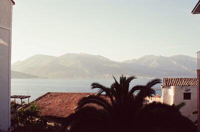 Mountains across the gulf seen over rooftops — Gaeta & the coast, Italy (28 May - 3 June 2000)