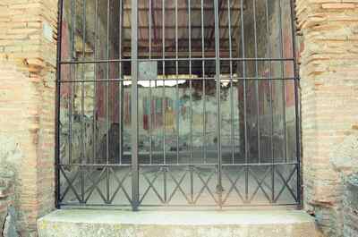 A barred frescoed house interior — Pompeii, Italy (28 May - 3 June 2000)