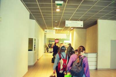Travellers walking through the ferry arrival hall — Ireland, Ireland (4-9 July 2000)