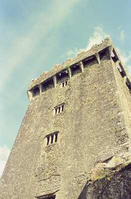 The towering keep of Blarney Castle against the sky — Cork, Ireland (4-9 July 2000)