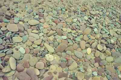 Multicoloured smooth pebbles covering a beach — Dingle Peninsula, Ireland (4-9 July 2000)