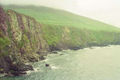 Mist-shrouded sea cliffs at Slea Head — Dingle Peninsula, Ireland (4-9 July 2000)
