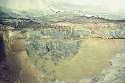 Stalactites lining a tiered cave wall — Ireland, Ireland (4-9 July 2000)